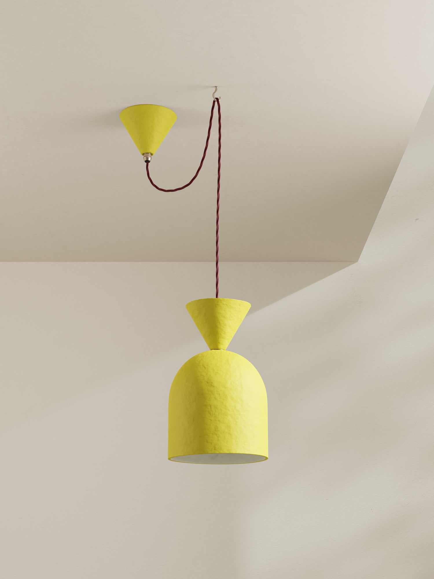 Bell Pendant ceiling light made of hand-painted paper pulp in bright yellow