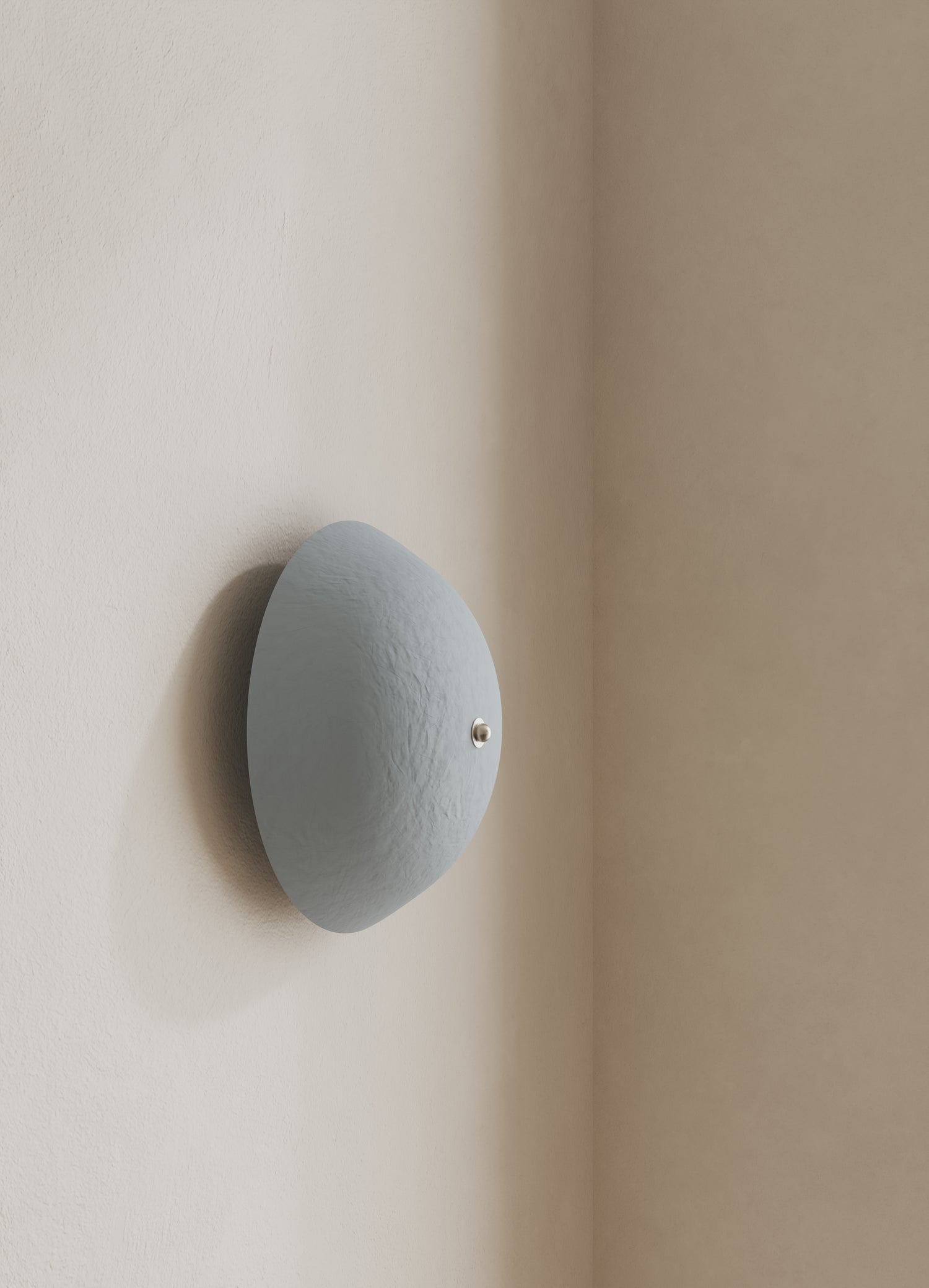 Wall-mounted domed light fixture with a light blue shade