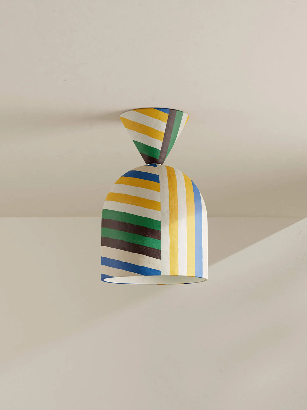 Colorful striped ceiling lamp on a neutral background
