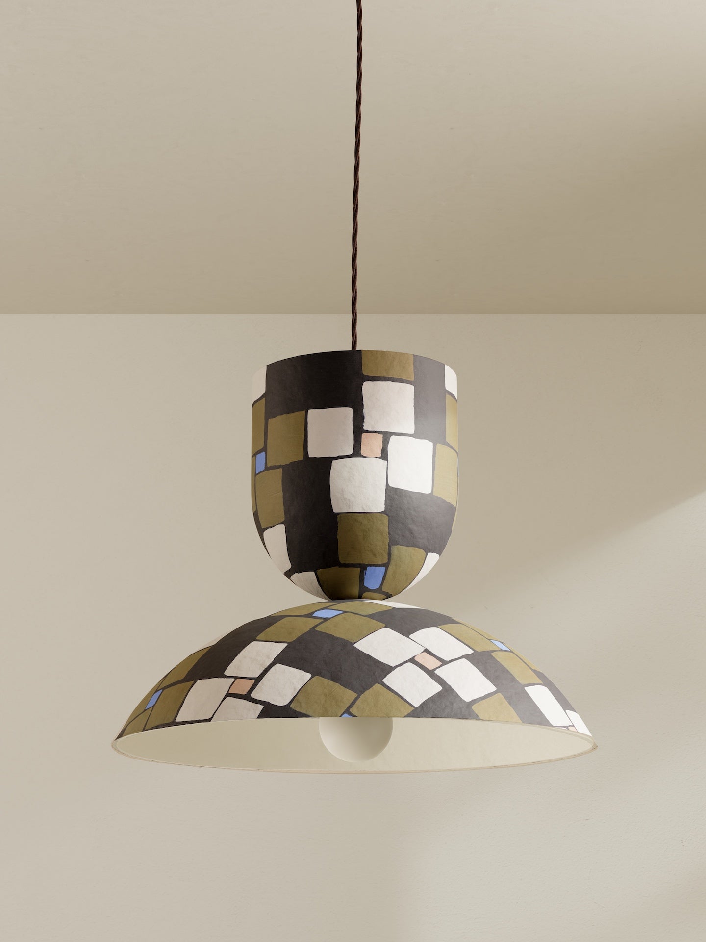 Buoy pendant, a large ceiling light made of paper pulp and hand-painted in dark brown mosaic Frieze pattern