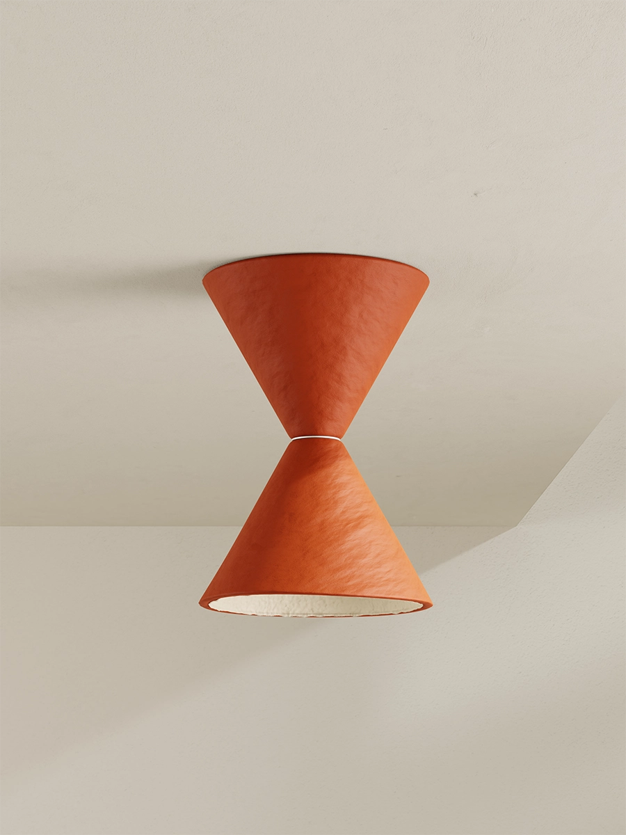 Ceiling mounted spotlight in brick-red with an off white interior