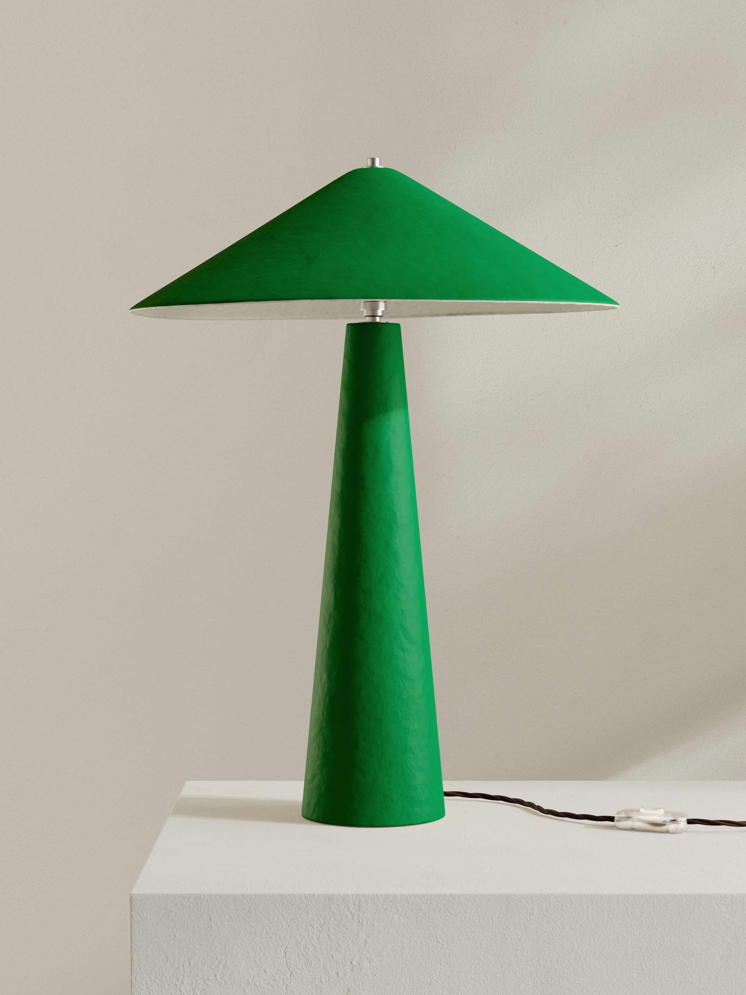 Parasol table lamp made for 8 Holland Street, crafted from hand-painted paper pulp in vibrant palm green.