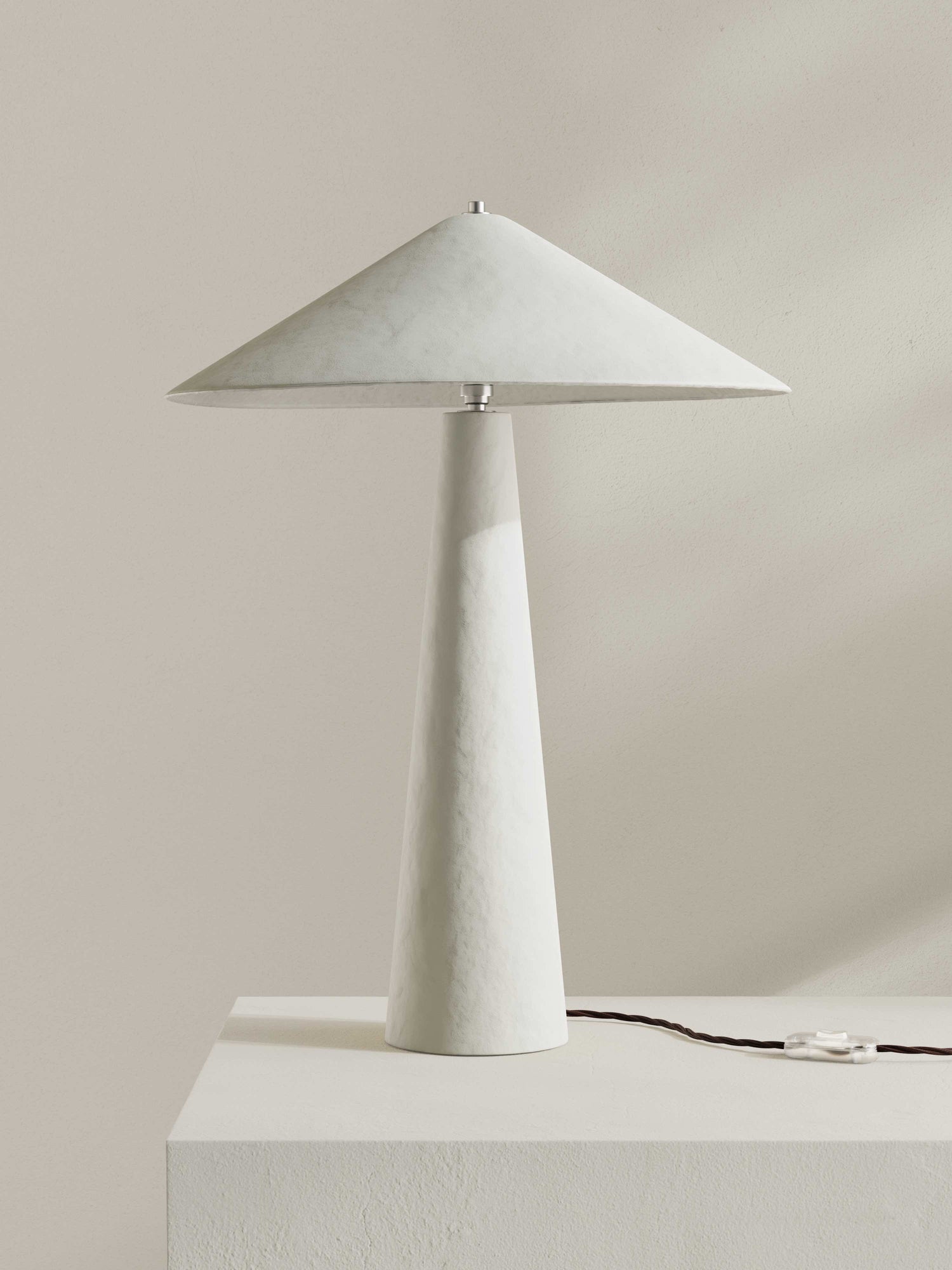 Parasol table lamp made for 8 Holland Street, with tall stem and wide shade, made of hand-painted paper pulp in chalk white.