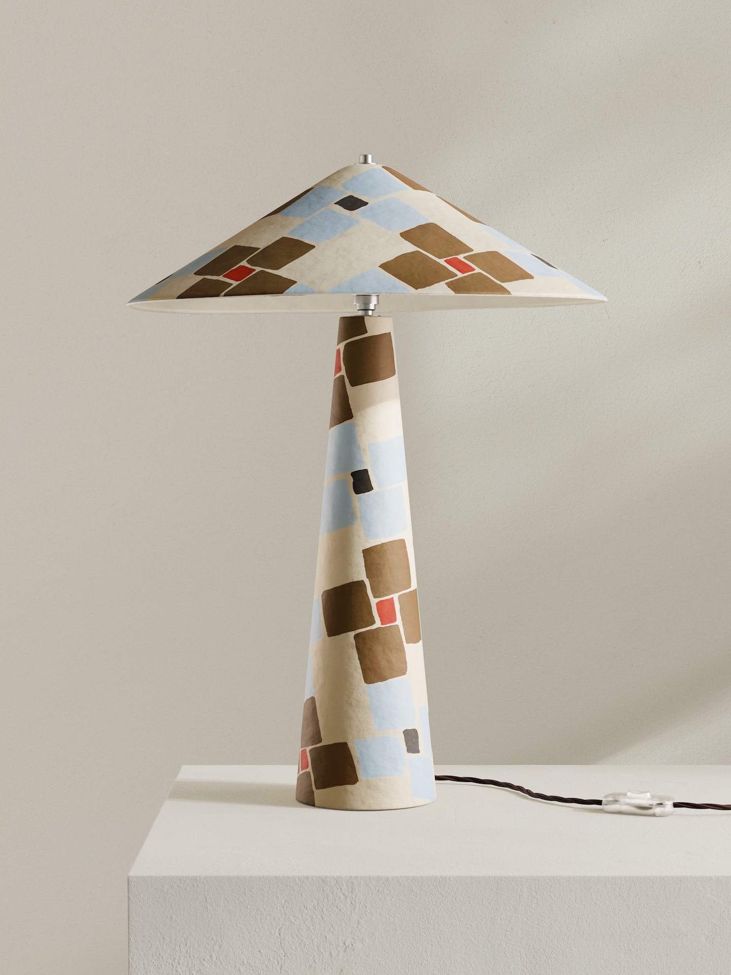 Parasol table lamp in Frieze pattern with mosaic design in cream, accented with light blue, dark gold and orange details.